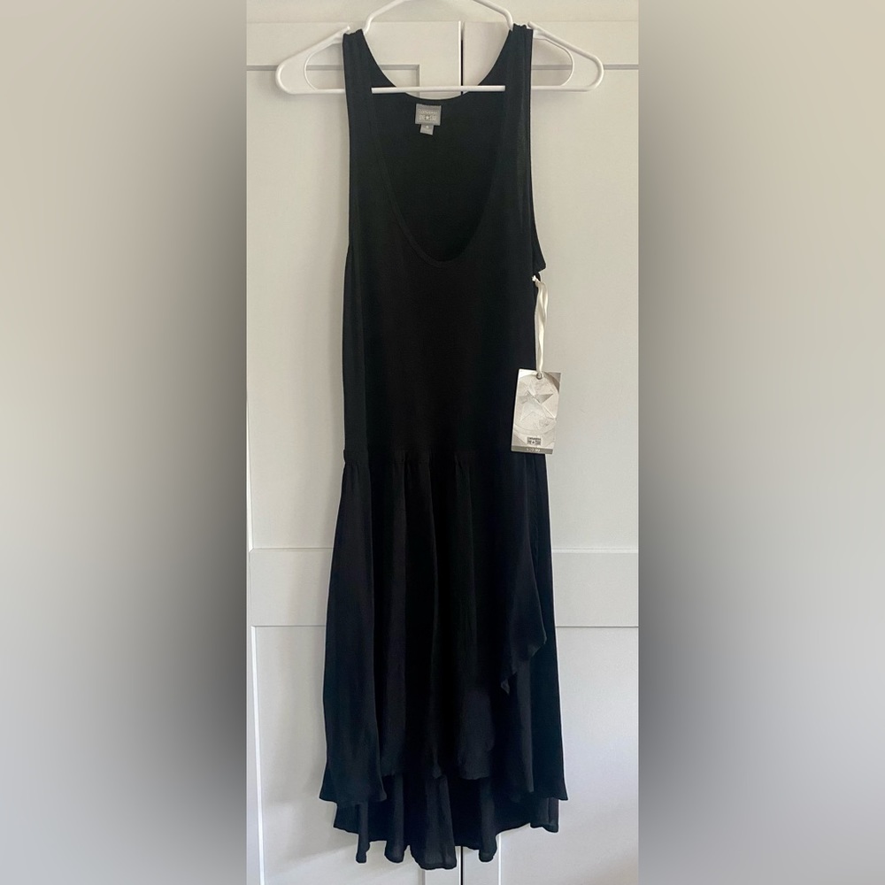 Converse black dress. Dress up with a belt and heels or dress down with tennies.